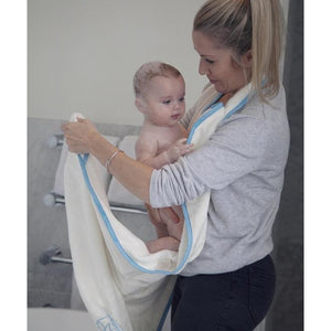 how to wrap your baby in a towel after bathtime - with the Cuddledry handsfree apron towel